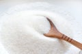 White sugar in a wooden spoon in bulk and cubes Royalty Free Stock Photo