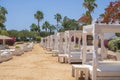 White sun canopy with mattress on luxury sand beach in tropical resort in Red Sea coast in Egypt, Africa Royalty Free Stock Photo