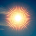 White sun at the center, radiating orange and yellow rays outward in a Royalty Free Stock Photo