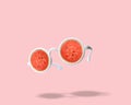 White sunglasses with watermelon on pink background. Royalty Free Stock Photo