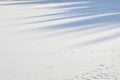 white sunny snow background with blue shadows Royalty Free Stock Photo
