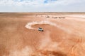 A white SUV car dune drifting in desert Royalty Free Stock Photo