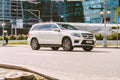 White SUV car in motion. Mercedes GLS fast speed drive on city road Royalty Free Stock Photo