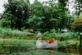 The white swan or duck pedal boat is moored in a lake in the park. Royalty Free Stock Photo