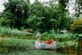 The white swan or duck pedal boat is moored in a lake in the park. Royalty Free Stock Photo