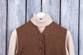 White sweater collar and brown jacket. Royalty Free Stock Photo