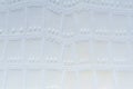 White synthetic leather texture with crocodile pattern embossing closeup detail Royalty Free Stock Photo