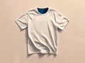 A white t-shirt on a beige background with a blue collar Royalty Free Stock Photo
