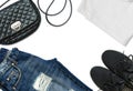 White t-shirt, blue boyfriend jeans, bag and black textile shoes Royalty Free Stock Photo