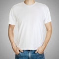 White t-shirt on a man template on gray background Royalty Free Stock Photo
