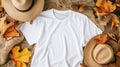 a white t-shirt mockup with a blank shirt template photo, featuring stylish fall accessories against a rustic burlap