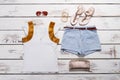 White t-shirt and shorts with accessories. Royalty Free Stock Photo