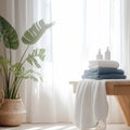White table adorned with tidy towels and vibrant houseplants Royalty Free Stock Photo