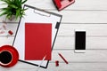 White table boards folder red notepad cup morning coffee clock paper clip office office Royalty Free Stock Photo