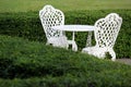 White table and chair in garden Royalty Free Stock Photo