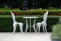 White table and chair in garden Royalty Free Stock Photo