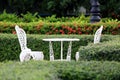 White table and chair in garden Royalty Free Stock Photo