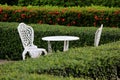 White table and chair in garden Royalty Free Stock Photo