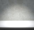 White table with concrete background Royalty Free Stock Photo
