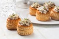 White table with creamy Chicken and Mushroom Vol Au Vent. Appetizer