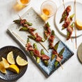 a tray topped with assorted food on top of a white table Royalty Free Stock Photo