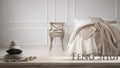 White table shelf with pebble balance and 3d letters making the word feng shui over evintage classic bedroom with soft bed full of