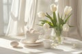 a white table with tulips, eggs and cups in it Royalty Free Stock Photo