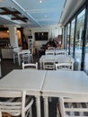 White tables and chairs in a cafe