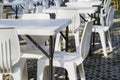 White tables and chairs in festival