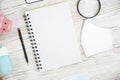 White Tablet With Blank Screen, laptop and accessories and office stuff On Wooden Desk With Stationary Objects , Top View,Travel c Royalty Free Stock Photo