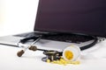 White tablet, laptop and doctor tools on white background