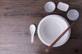 White tablewear set with chopsticks on wood table Royalty Free Stock Photo