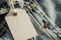 white tag with a metallic eyelet on a denim jackets pocket Royalty Free Stock Photo