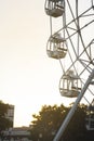 white tall ferris wheel in sight of a blue cloudless sky