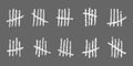 White tally marks on gray background. Chalk drawn sticks sorted by four and crossed out by slash line. Counting stripes