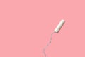 White tampon on pink background. Isolated on pink. Woman`s hygiene and health Royalty Free Stock Photo