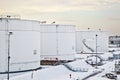 White tanks in tank farm with snow in winter