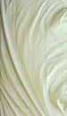 White tarpaulin with swirls and corner creases Royalty Free Stock Photo