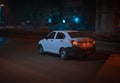 White Taxi cab at night.moving shot . Kolkata city .