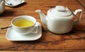 White tea set on wooden table Royalty Free Stock Photo