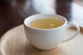 White teacup on wooden table Royalty Free Stock Photo