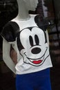 White tee shirt printed mickey mouse by Walt Disney in a fashion store showroom