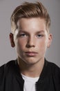 White teenage boy looking to camera, portrait, vertical Royalty Free Stock Photo