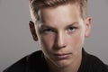 White teenage boy looking up to camera, close up Royalty Free Stock Photo
