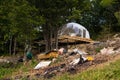 White Tent Geosphere in the Forest Cozy Camping Glamping Vacation Lifestyle Concept Outdoors Cabin