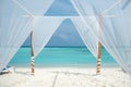 White tent for wedding ceremonies or romantic evening on a maldivian island. Royalty Free Stock Photo