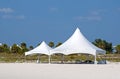 White tents on the beach