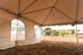 White tents in a dry field outdoors Royalty Free Stock Photo