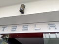 White Tesla sign