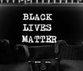 White text BLACK LIVES MATTER on black background the typewriter